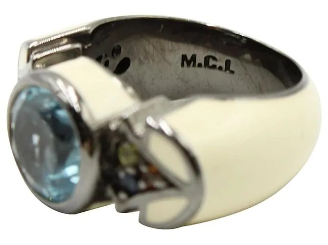 Autre Marque Anillo de topacio azul y esmalte de marfil 
