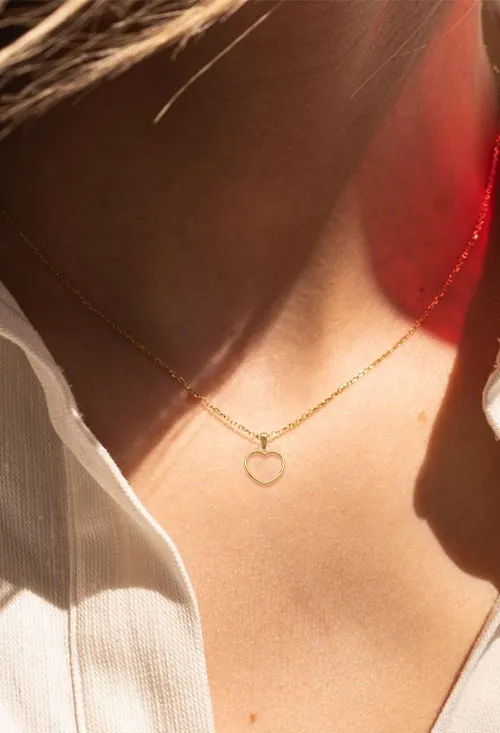 COLGANTE DE ORO 18 KILATES CON FORMA DE CORAZóN 002_84098G
