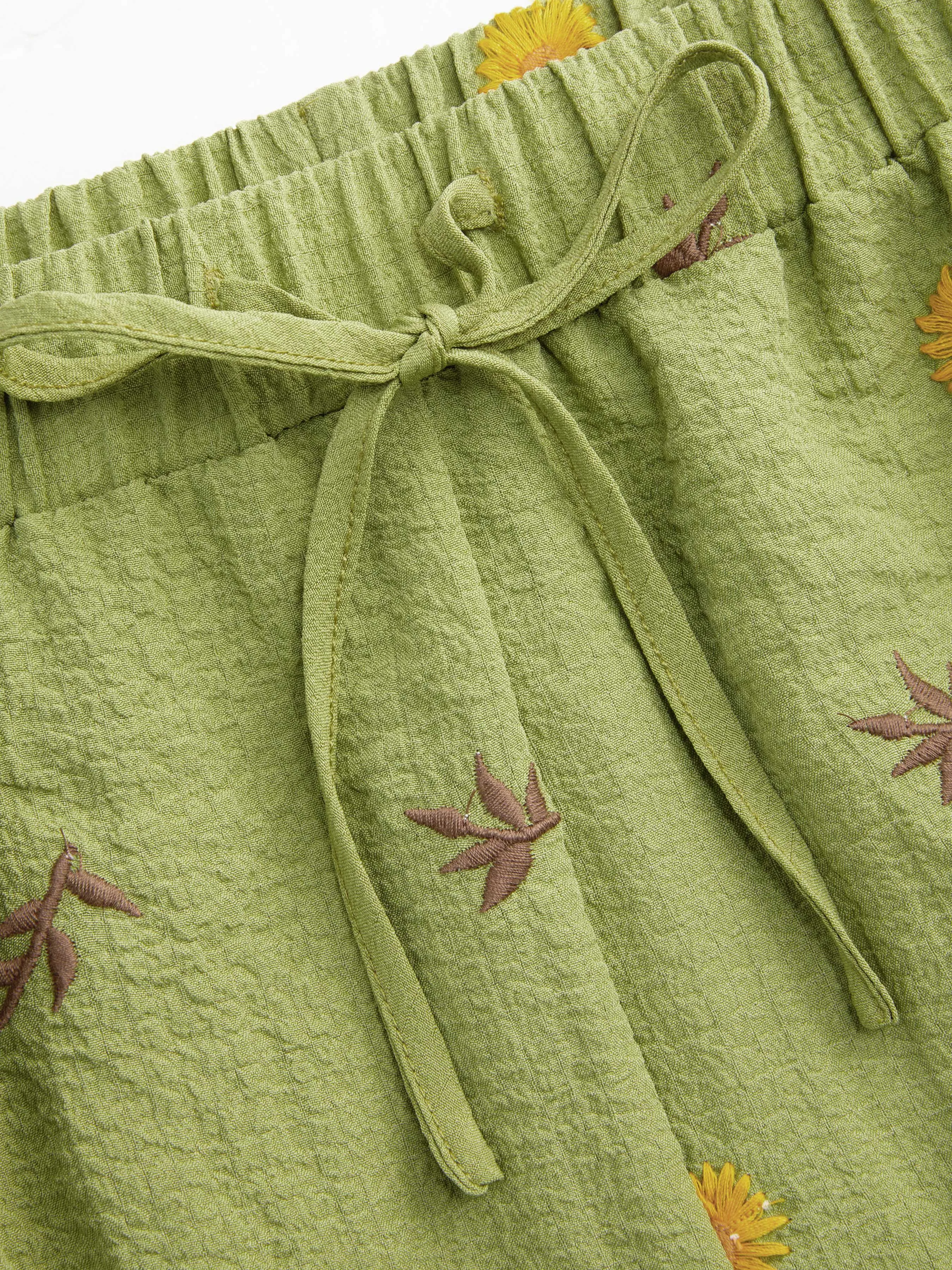 Pantalón Ancho de Cintura Elástica con Bordado Floral y Bolsillos Curvy