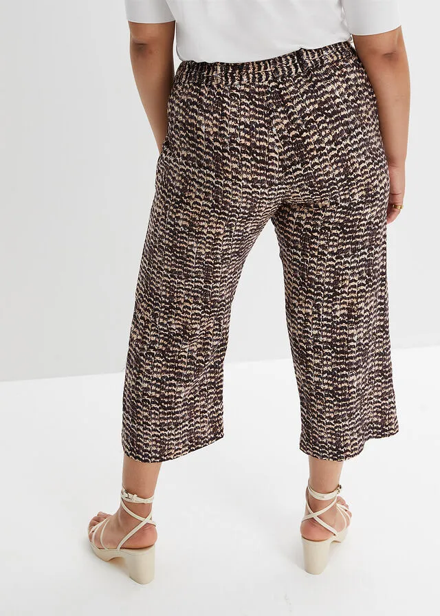PANTALóN CON CINTURILLA ELáSTICA BEIGENEGRO CON ESTAMPADO DE CEBRA