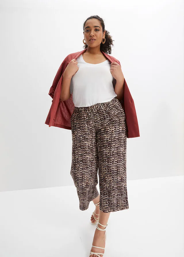 PANTALóN CON CINTURILLA ELáSTICA BEIGENEGRO CON ESTAMPADO DE CEBRA