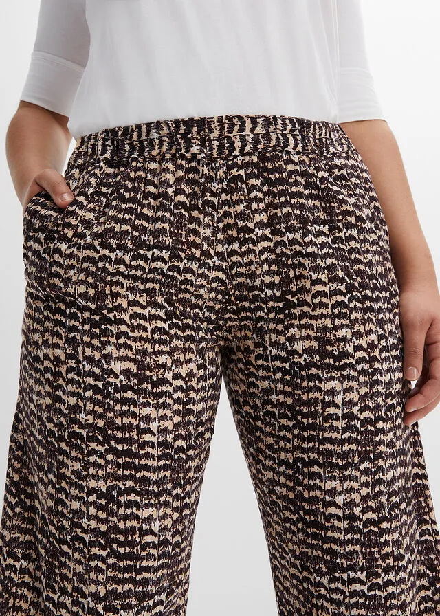 PANTALóN CON CINTURILLA ELáSTICA BEIGENEGRO CON ESTAMPADO DE CEBRA