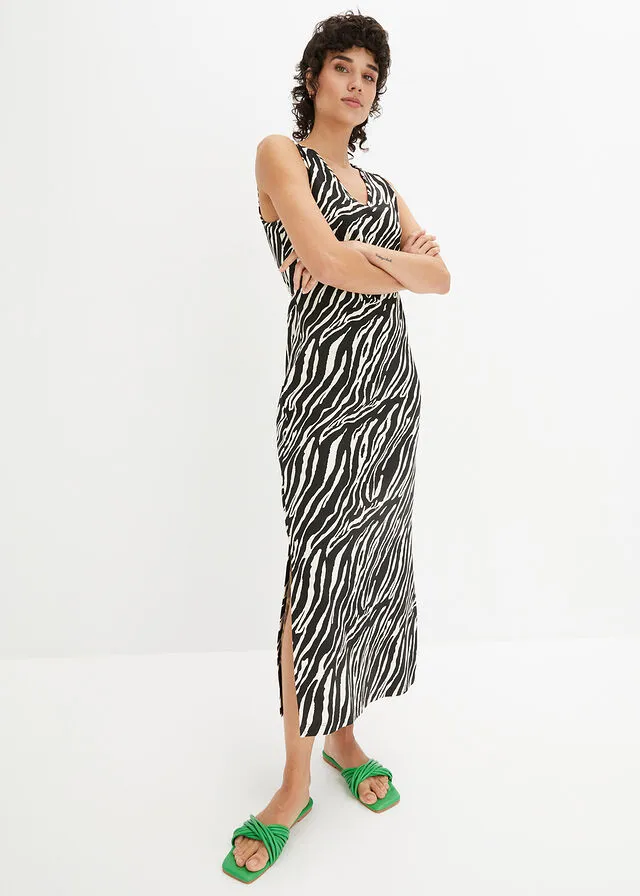 Vestido camisero con detalle en la espalda Negro/crudo con estampado de cebra
