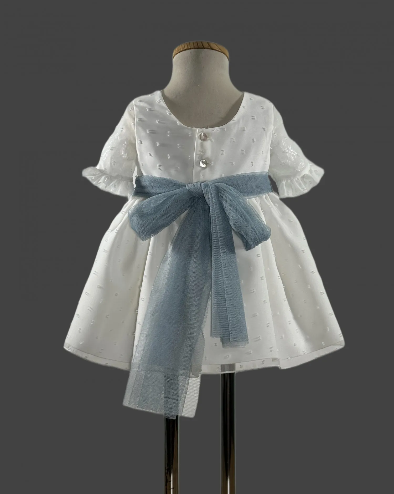 Vestido de bebé en plumeti de tul en tres colores. Colección Ninfa